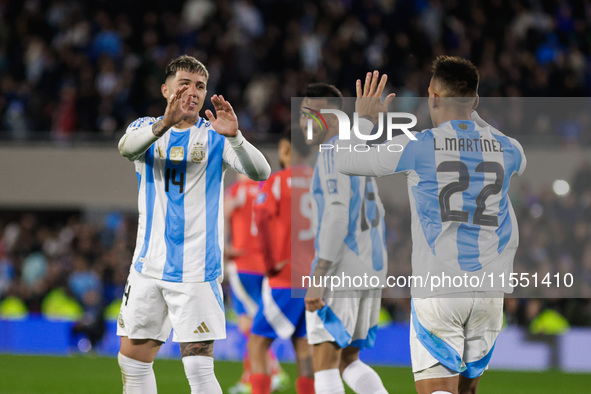 Enzo Fernandez and Lautaro Martinez of Argentina celebrate after the first goal of their team during the FIFA World Cup 2026 Qualifier match...