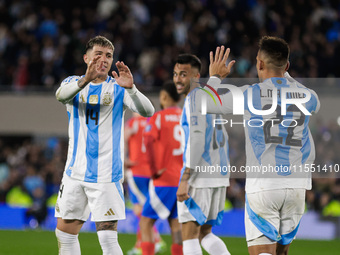 Enzo Fernandez and Lautaro Martinez of Argentina celebrate after the first goal of their team during the FIFA World Cup 2026 Qualifier match...