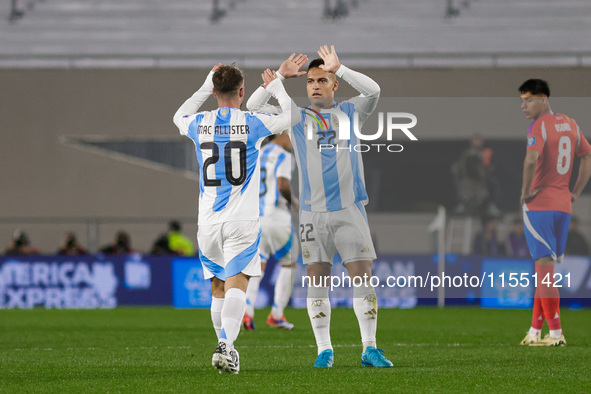 Alexis Mac Allister celebrates with Lautaro Martinez after scoring the first goal of his team during the FIFA World Cup 2026 Qualifier match...