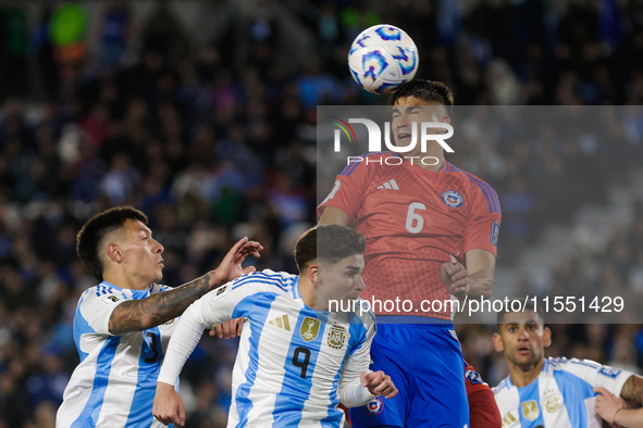 Thomas Galdames of Chile and Julian Alvarez of Argentina are in action during the FIFA World Cup 2026 Qualifier match between Argentina and...