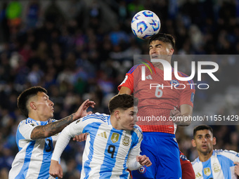 Thomas Galdames of Chile and Julian Alvarez of Argentina are in action during the FIFA World Cup 2026 Qualifier match between Argentina and...