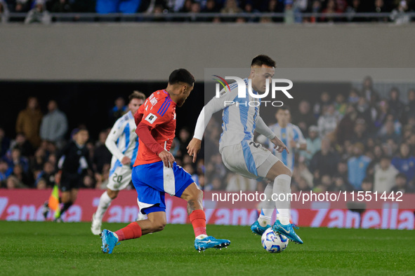 Lautaro Martinez of Argentina and Paulo Diaz of Chile are in action during the FIFA World Cup 2026 Qualifier match between Argentina and Chi...