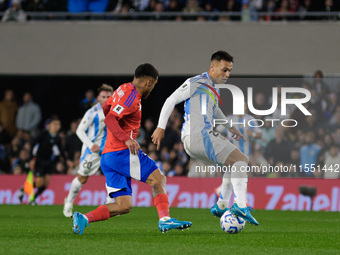 Lautaro Martinez of Argentina and Paulo Diaz of Chile are in action during the FIFA World Cup 2026 Qualifier match between Argentina and Chi...