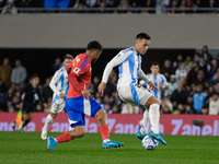 Lautaro Martinez of Argentina and Paulo Diaz of Chile are in action during the FIFA World Cup 2026 Qualifier match between Argentina and Chi...