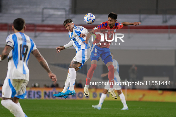 Enzo Fernandez of Argentina and Dario Osorio of Chile are in action during the FIFA World Cup 2026 Qualifier match between Argentina and Chi...