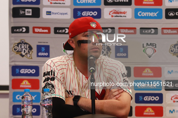 Julian Ornelas #31 of Diablos Rojos speaks during a press conference before match 2 between Sultanes de Monterrey and Diablos Rojos del Mexi...