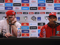 Julian Ornelas #31 and Lorenzo Bundy #30, manager of Diablos Rojos, speak during a press conference before match 2 between Sultanes de Monte...