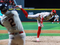 Erick Leal #49 of Diablos Rojos pitches the ball against Javier Salazar #2 of Sultanes de Monterrey during match 2 between Sultanes de Monte...