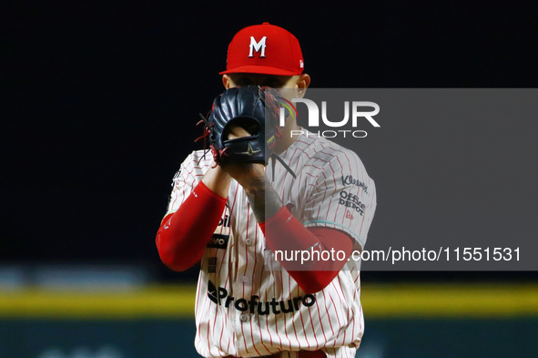 Erick Leal #49 of Diablos Rojos pitches the ball against Sultanes de Monterrey during match 2 between Sultanes de Monterrey and Diablos Rojo...