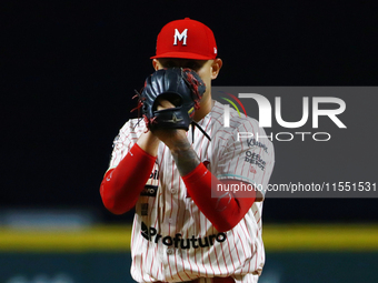 Erick Leal #49 of Diablos Rojos pitches the ball against Sultanes de Monterrey during match 2 between Sultanes de Monterrey and Diablos Rojo...