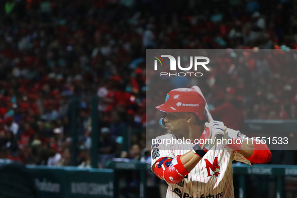 Robinson Cano #22 of Diablos Rojos bats against Sultanes de Monterrey during match 2 between Sultanes de Monterrey and Diablos Rojos del Mex...