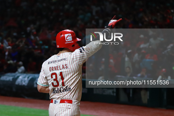 Julian Ornelas #31 of Diablos Rojos celebrates against Sultanes de Monterrey during match 2 between Sultanes de Monterrey and Diablos Rojos...