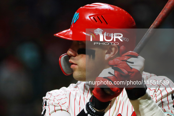 Julian Ornelas #31 of Diablos Rojos bats against Sultanes de Monterrey during match 2 between Sultanes de Monterrey and Diablos Rojos del Me...