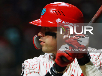 Julian Ornelas #31 of Diablos Rojos bats against Sultanes de Monterrey during match 2 between Sultanes de Monterrey and Diablos Rojos del Me...