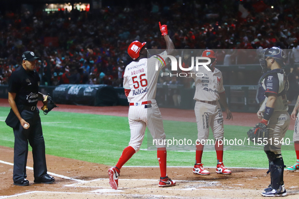 Aristides Aquino #56 of Diablos Rojos celebrates against Sultanes de Monterrey during the match between Sultanes de Monterrey and Diablos Ro...