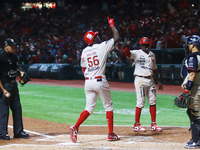 Aristides Aquino #56 of Diablos Rojos celebrates against Sultanes de Monterrey during the match between Sultanes de Monterrey and Diablos Ro...