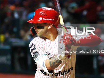 Juan Carlos Gamboa #47 of Diablos Rojos bats against Sultanes de Monterrey during match 2 between Sultanes de Monterrey and Diablos Rojos de...