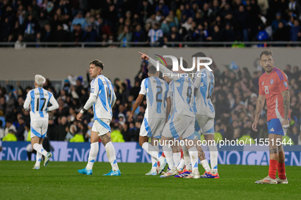 Julian Alvarez of Argentina celebrates with his teammates after scoring the second goal of his team during the FIFA World Cup 2026 Qualifier...