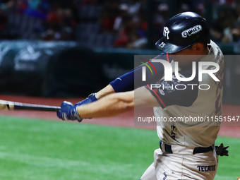 Victor Mendoza #25 of Sultanes de Monterrey hits the ball against Diablos Rojos during match 2 between Sultanes de Monterrey and Diablos Roj...