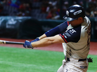 Victor Mendoza #25 of Sultanes de Monterrey hits the ball against Diablos Rojos during match 2 between Sultanes de Monterrey and Diablos Roj...