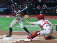 Ramiro Pena #19 of Sultanes de Monterrey hits the ball against Diablos Rojos during match 2 between Sultanes de Monterrey and Diablos Rojos...