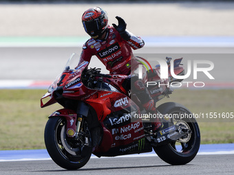 Francesco Bagnaia of Italy and Ducati Lenovo Team greets the fans during Free Practice of MotoGP of San Marino at Misano World Circuit in Mi...