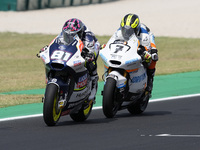 Senna Agius of Australia and Liqui Moly Husqvarna Intact GP rides on track in front of Barry Baltus of Belgium and RW Racing GP during Moto2...