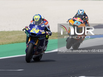 Marcos Ramirez of Spain and OnlyFans American Racing Team rides on track in front of Celestino Vietti of Italy and Red Bull KTM Ajo during M...