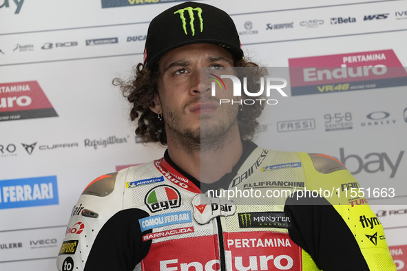 Marco Bezzecchi of Italy and the Pertamina Enduro VR46 Racing Team look on at the box during Free Practice of MotoGP of San Marino at Misano...