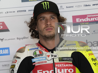 Marco Bezzecchi of Italy and the Pertamina Enduro VR46 Racing Team look on at the box during Free Practice of MotoGP of San Marino at Misano...