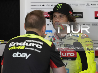 Marco Bezzecchi of Italy and Pertamina Enduro VR46 Racing Team looks on at the box during Free Practice of MotoGP of San Marino at Misano Wo...