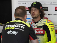 Marco Bezzecchi of Italy and Pertamina Enduro VR46 Racing Team looks on at the box during Free Practice of MotoGP of San Marino at Misano Wo...