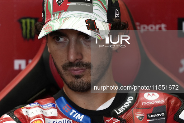 Francesco Bagnaia of Italy and Ducati Lenovo Team looks on at the box during Free Practice of MotoGP of San Marino at Misano World Circuit i...