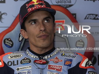 Marc Marquez of Spain and Gresini Racing MotoGP looks on at the box during Free Practice of MotoGP of San Marino at Misano World Circuit in...