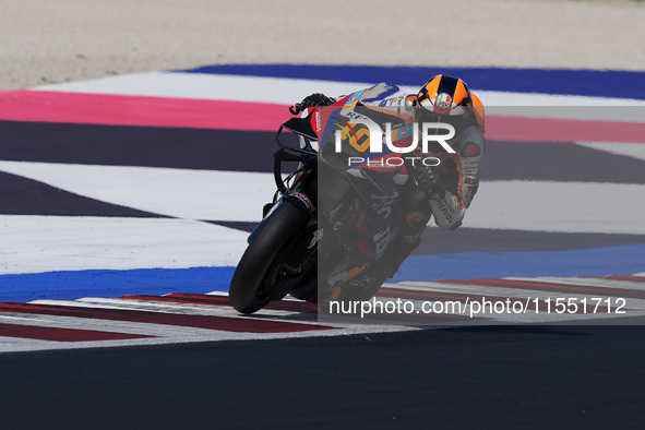 Luca Marini of Italy and Repsol Honda Team rides on track during Free Practice of MotoGP of San Marino at Misano World Circuit in Misano Adr...