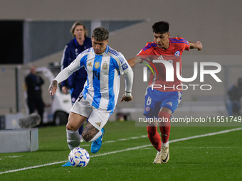 Enzo Fernandez of Argentina and Dario Osorio of Chile are in action during the FIFA World Cup 2026 Qualifier match between Argentina and Chi...