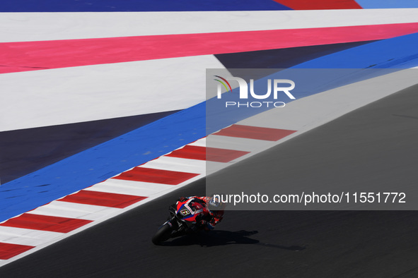 Stefan Bradl of Germany and the HRC Test Team rides on track during Free Practice of MotoGP of San Marino at Misano World Circuit in Misano...