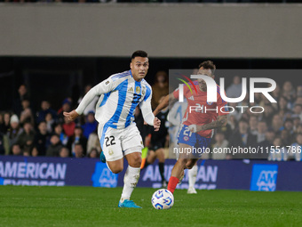 Lautaro Martinez of Argentina and Matias Catalan of Chile are in action during the FIFA World Cup 2026 Qualifier match between Argentina and...