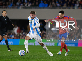 Alexis Mac Allister of Argentina and Claudio Baeza of Chile are in action during the FIFA World Cup 2026 Qualifier match between Argentina a...