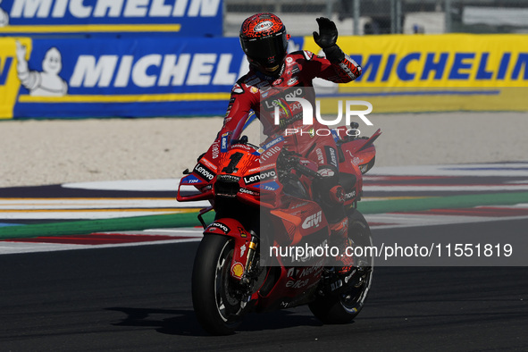 Francesco Bagnaia of Italy and Ducati Lenovo Team greets the fans during Free Practice of MotoGP of San Marino at Misano World Circuit in Mi...