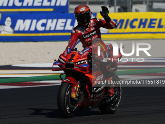 Francesco Bagnaia of Italy and Ducati Lenovo Team greets the fans during Free Practice of MotoGP of San Marino at Misano World Circuit in Mi...