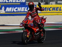 Francesco Bagnaia of Italy and Ducati Lenovo Team greets the fans during Free Practice of MotoGP of San Marino at Misano World Circuit in Mi...