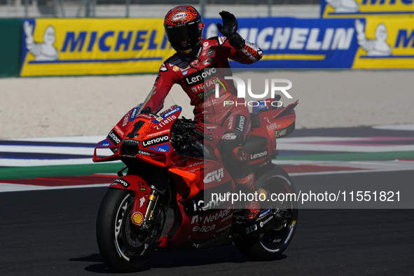 Francesco Bagnaia of Italy and Ducati Lenovo Team greets the fans during Free Practice of MotoGP of San Marino at Misano World Circuit in Mi...