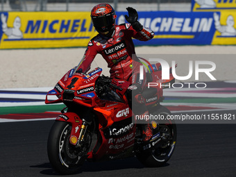 Francesco Bagnaia of Italy and Ducati Lenovo Team greets the fans during Free Practice of MotoGP of San Marino at Misano World Circuit in Mi...