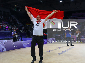 Ashraf Zaghloul of Team Egypt celebrates after winning the Men's Sitting Volleyball Bronze Medal Match on day nine of the Paris 2024 Summer...