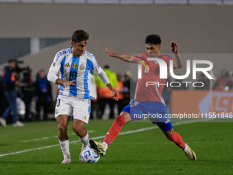 Paulo Dybala of Argentina and Dario Osorio of Chile are in action during the FIFA World Cup 2026 Qualifier match between Argentina and Chile...