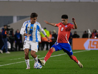 Paulo Dybala of Argentina and Dario Osorio of Chile are in action during the FIFA World Cup 2026 Qualifier match between Argentina and Chile...