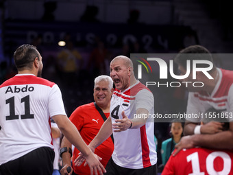 Athletes of Team Egypt celebrate after winning the Men's Sitting Volleyball Bronze Medal Match on day nine of the Paris 2024 Summer Paralymp...