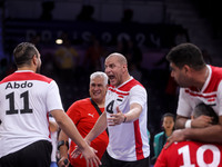 Athletes of Team Egypt celebrate after winning the Men's Sitting Volleyball Bronze Medal Match on day nine of the Paris 2024 Summer Paralymp...