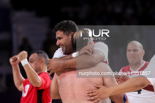 Athletes of Team Egypt celebrate after winning the Men's Sitting Volleyball Bronze Medal Match on day nine of the Paris 2024 Summer Paralymp...